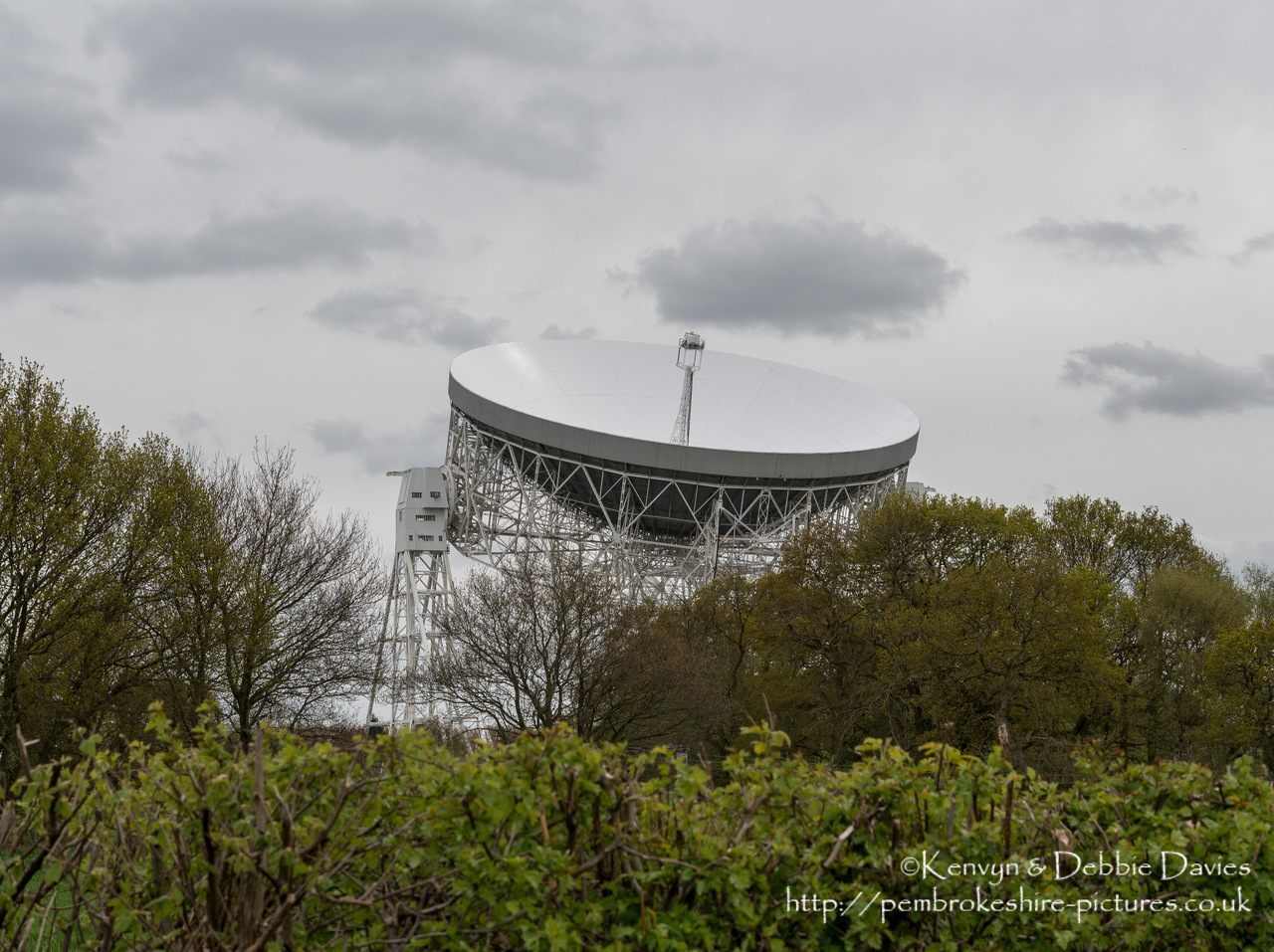 The observatory was established in 1945 by Sir Bernard Lovell, a radio astronomer at the University of Manchester who wanted to investigate cosmic rays after his work on radar during the Second World War.<br/><br/>Construction was completed in 1957 (at which time it was the largest steerable telescope in the world and is still the third largest), the telescope is 250ft in diameter and weighs 3,200 tons.