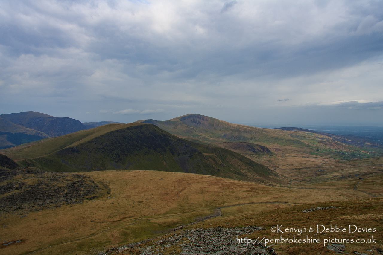 View from about three quarters of the way up Snowdon, the highest the rack & pinion railway (the only on in the UK) was going at the time. Weather discouraged climbing to the top....