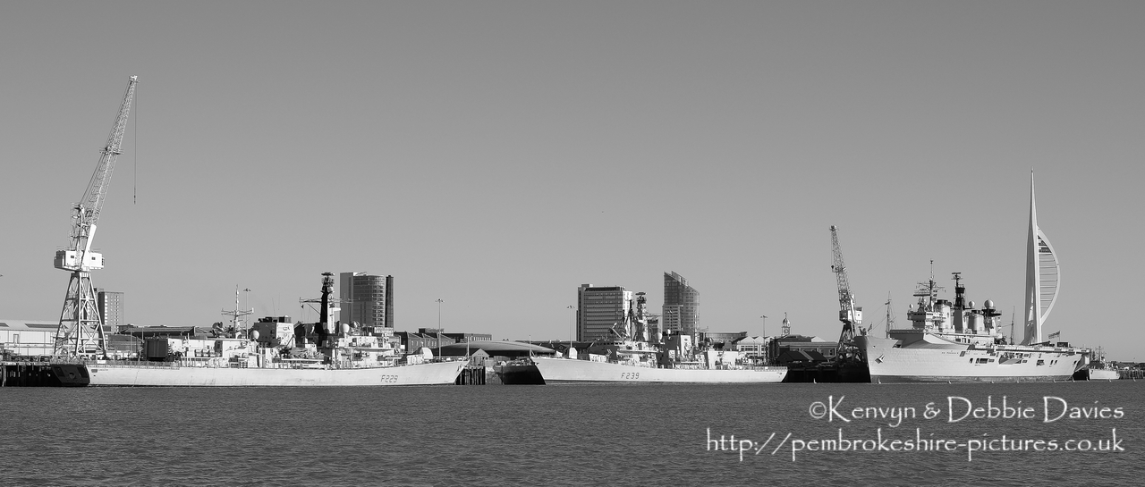 HMS Lancaster (F229) and HMS Richmond, two of the Royal Navy's Type 23 frigates in harbour with the Illustrious.<br/><br/>HMS Illustrious is an "Invincible" class light aircraft carrier, the middle of three built for the Royal Navy in the late 70s and early 80s (she was commissioned in 1982). Following the retirement of the Harrier VTOL aircraft in 2010 she became and helicopter carrier and is the oldest (as of 2014) serving ship in the Royal Navy. We were lucky to see her before her final deployment following which she will be de-commissioned and preserved for the nation.