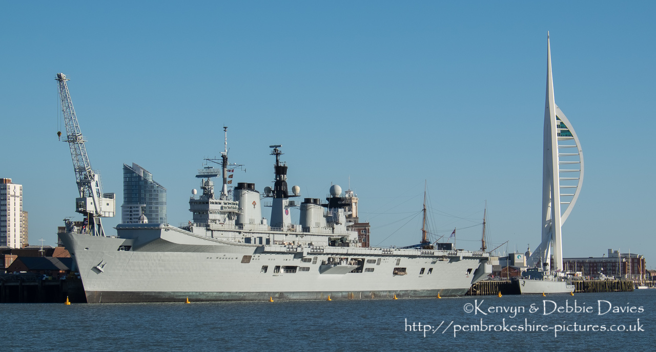HMS Illustrious is an "Invincible" class light aircraft carrier, the middle of three built for the Royal Navy in the late 70s and early 80s (she was commissioned in 1982). Following the retirement of the Harrier VTOL aircraft in 2010 she became and helicopter carrier and is the oldest (as of 2014) serving ship in the Royal Navy. We were lucky to see her before her final deployment following which she will be de-commissioned and preserved for the nation.