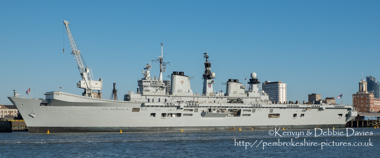 HMS Illustrious is an "Invincible" class light aircraft carrier, the middle of three built for the Royal Navy in the late 70s and early 80s (she was commissioned in 1982). Following the retirement of the Harrier VTOL aircraft in 2010 she became and helicopter carrier and is the oldest (as of 2014) serving ship in the Royal Navy. We were lucky to see her before her final deployment following which she will be de-commissioned and preserved for the nation.