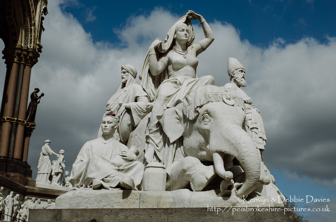 Officially the Prince Consort National Memorial.<br/><br/>Located in Kensington Gardens on Albert Memorial Road opposite the Royal Albert Hall.<br/><br/>Albert is shown holding the catalogue of the Great Exhibition of 1851, which he inspired and helped organise.