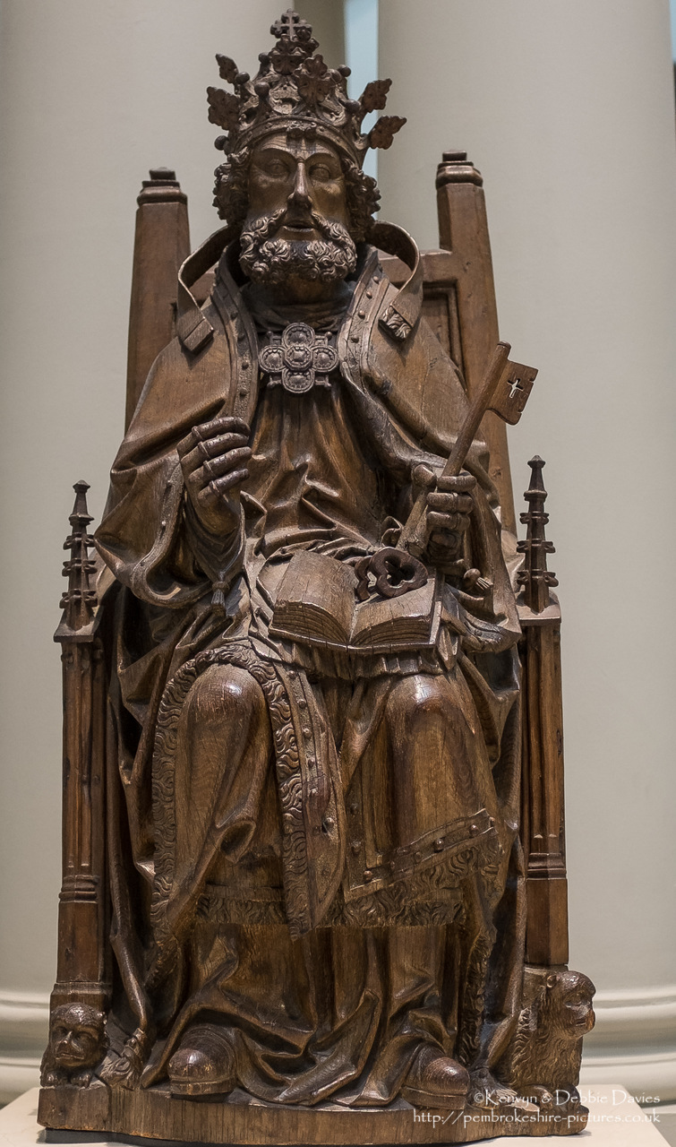 This figure of St. Peter originally held two keys. One is now broken, the other is restored. In the Gospel of St. Matthew, Jesus says to Peter, 'And I will give unto thee the keys of the kingdom of heaven.' St. Peter is often portrayed in medieval and Renaisssance art holding two keys.