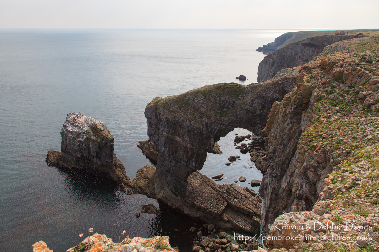 The Green Bridge of Wales is one of the most famous landmarks in Wales, and one of the most spectacular sites on the Pembrokeshire Coast. It is located close to Castlemartin in the south of the county, and is adjacent to the Stack Rocks and the Cauldron.
