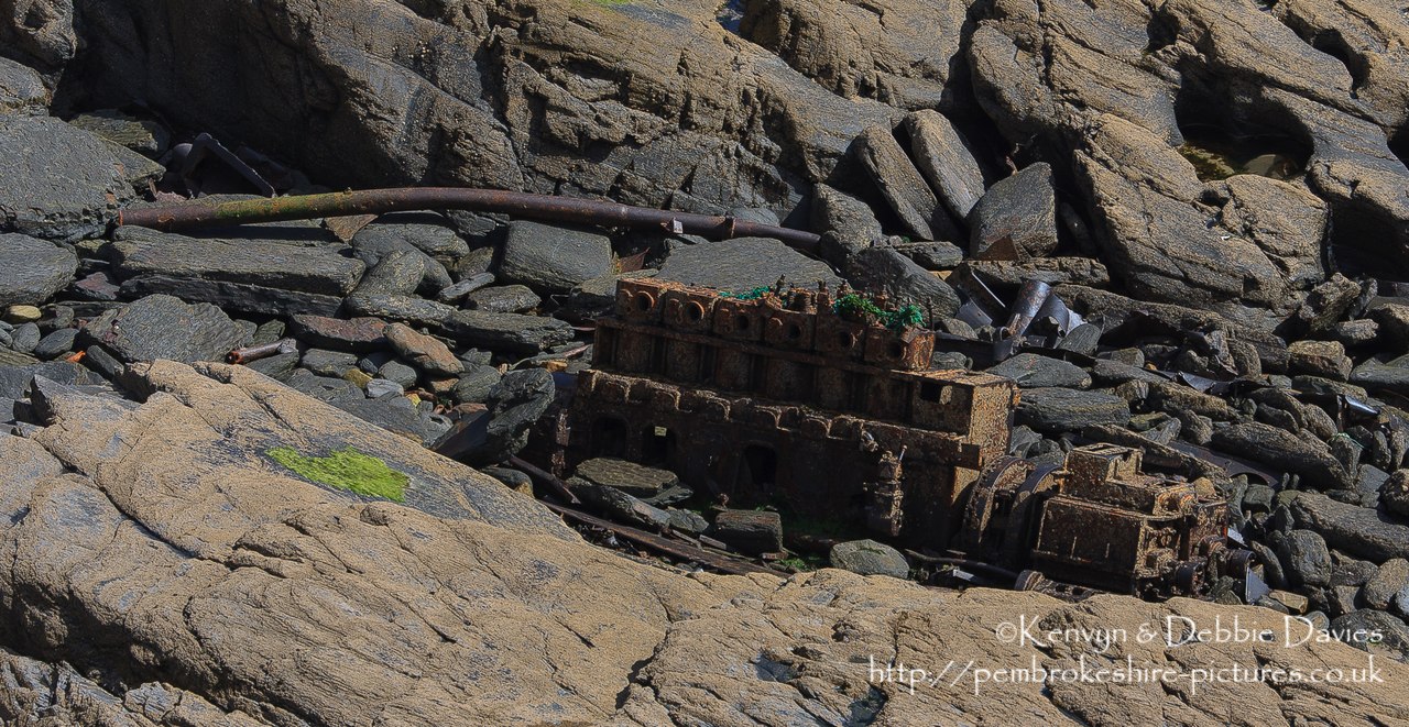 Along the coastal path a couple of miles north of Solva is the site of the wrecks of the Vernicos Alexia, Vernicos Georgios and Vernicos Barbara IV. I  1981 the Alexia was towing the Georgios and Barbara when it suffered engine problems. It's anchors failed to hold and all three tugs were swept ashore and wrecked. An engine block and a few scraps is all that remains although more can be seen at low tide.