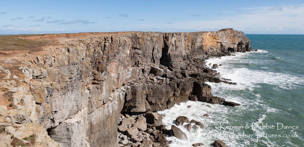 Cliffs at St Govan's Head with the Coastguard Lookout in the background.