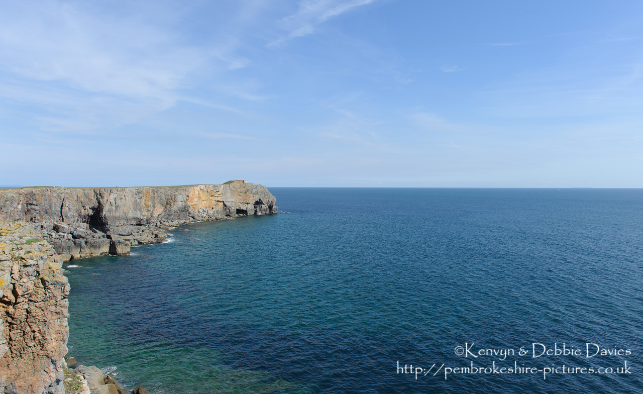 Cliffs at St Govan's Head with the Coastguard Lookout in the background.