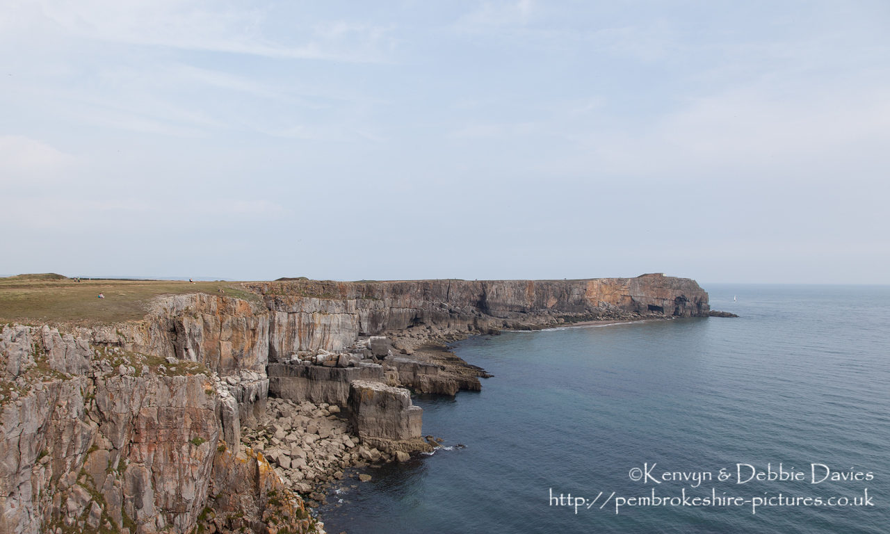 Cliffs at St Govan's Head with the Coastguard Lookout in the background.
