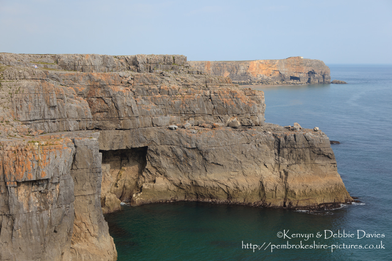 Cliffs at St Govan's Head with the Coastguard Lookout in the background.