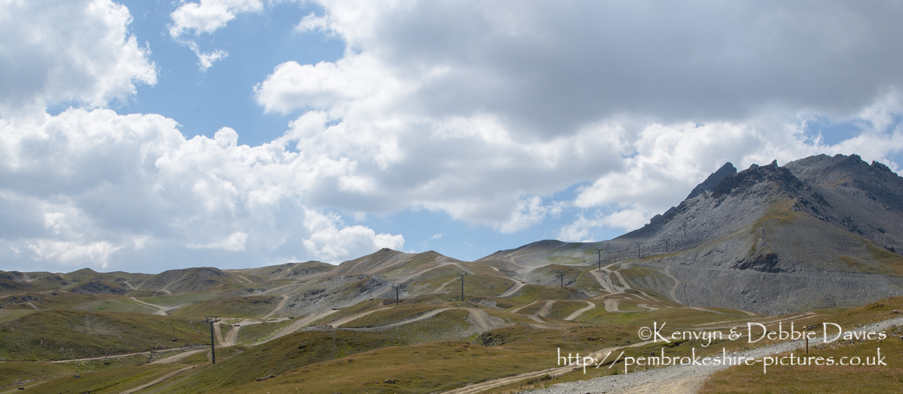 The Val d'Isère ski resort is used as an off-roading course during the summer months when there little snow about. Manufacturers use it to test their new 4x4's. Taken in 2003 with a Nikon D1X