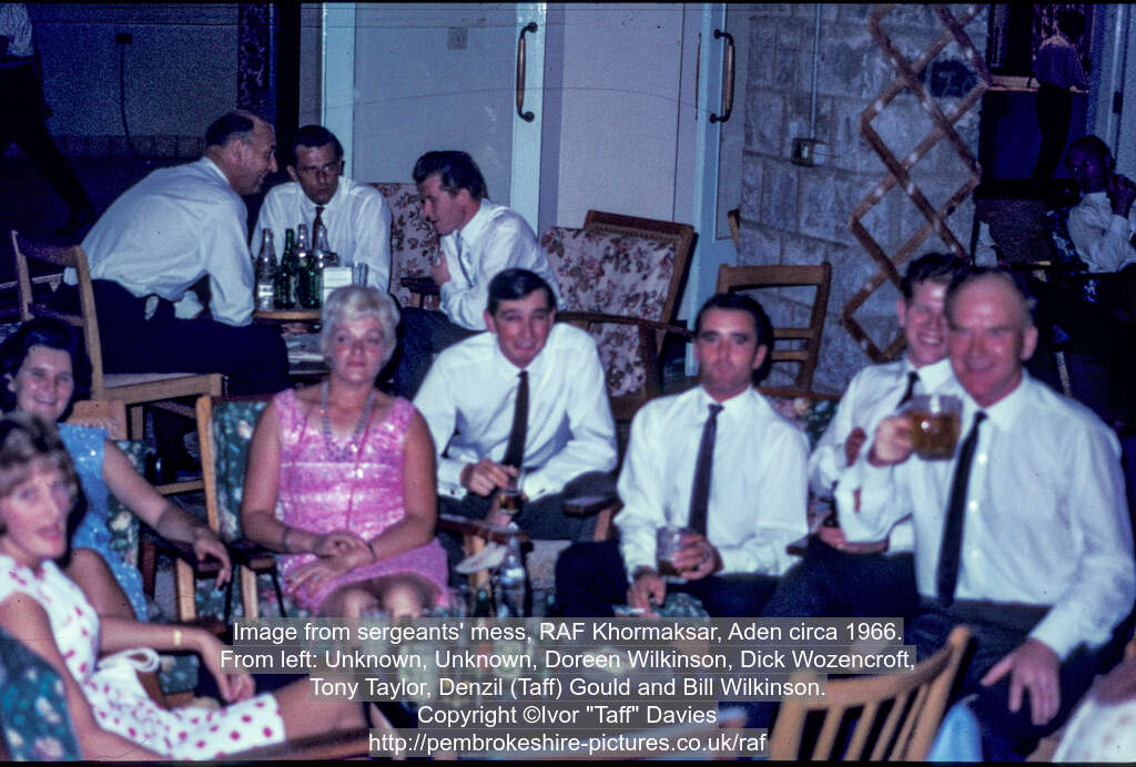 Image from sergeants' mess, RAF Khormaksar, Aden circa 1966. From left: Unknown, Unknown, Doreen Wilkinson, Dick Wozencroft, Tony Taylor, Denzil (Taff) Gould and Bill Wilkinson.