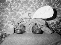 Result of keeping legs straight on parachute landing. Black and white print from Aden whilst based at RAF Khormaksar