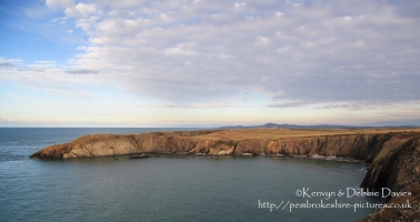 Traeth Llyfn is a small beach (it's high tide in this shot so there's not a lot to see of it) between Abereiddy and Porthgain. It is only accessible by the steps which are just visible to the centre right of the photo.