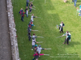 Learning to sword fight at Pembroke Castle, Pembrokeshire